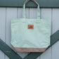 TOTE Leather Trimmed Tote